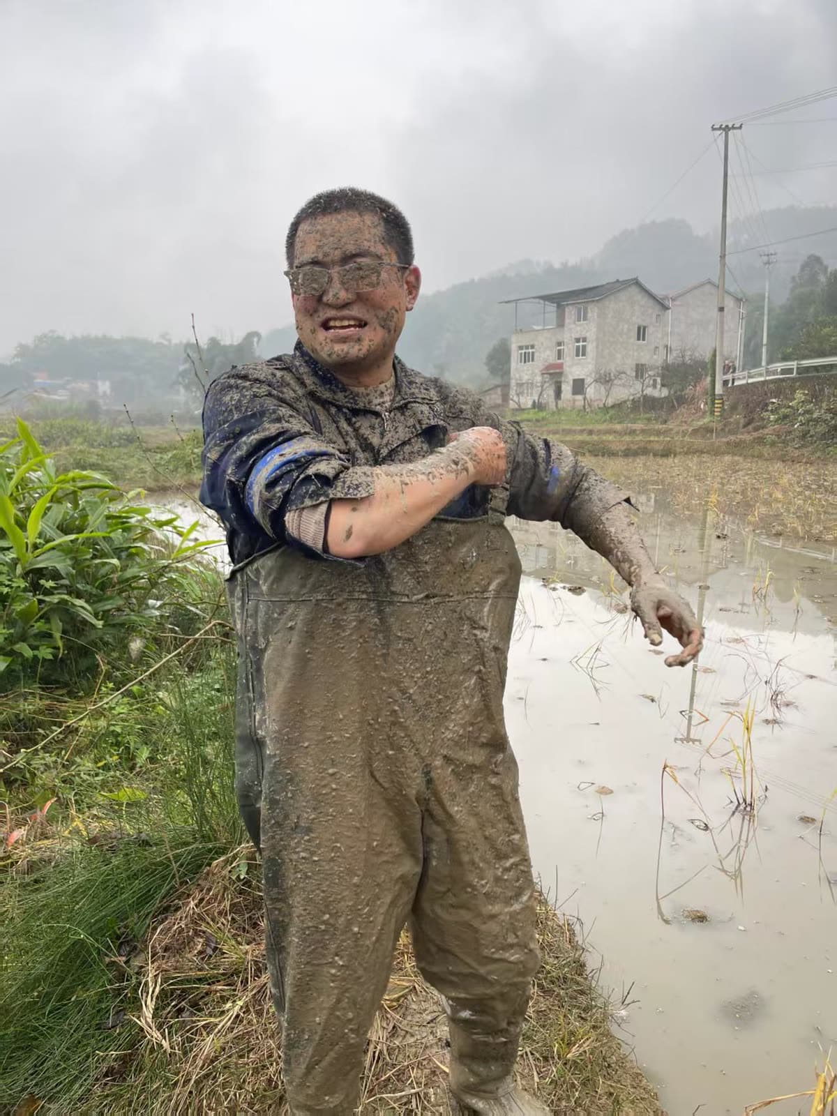 Mud-covered after power tiller field testing